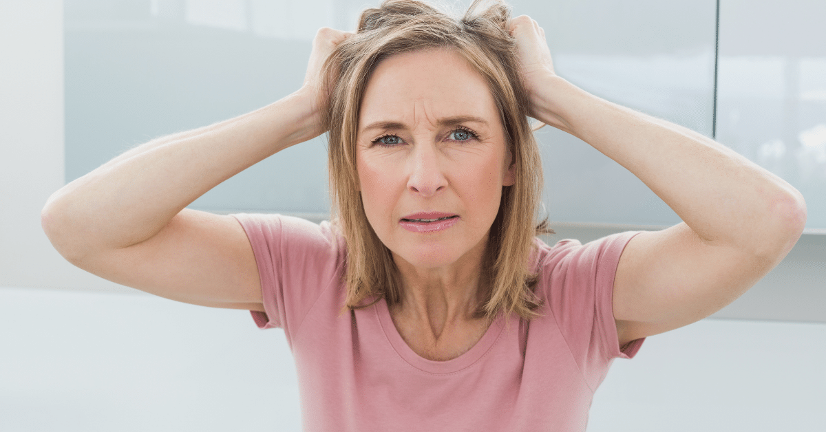 woman pulling hair for article mental effects of bad dieting advice