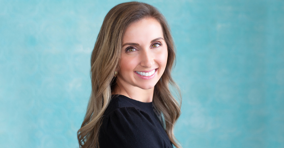 HEATHER DENTINO, APN, BLUE BACKGROUND HEADSHOT